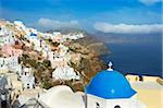 Church with blue dome, Oia (Ia) village, Santorini, Cyclades, Greek Islands, Greece, Europe