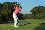 Golfer Concentrating on Tee