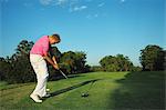 Golfer Concentrating on Tee