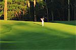 Young Male Golfer in Golf Course