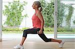 Older woman exercising at home