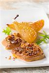 Foie gras topped with gingerbread crumbs ,confit pears