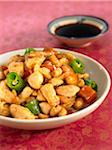 Chicken in Kung po sauce with peanuts,ginger and pimento