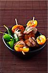 Pork and apricot brochettes