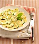 Zucchini carpaccio with gruyère and pine nuts