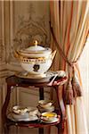 Soup tureen with pumpkin soup in a luxurious decor