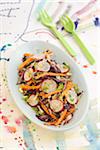 Red cabbage,carrot and radish salad with sesame seeds