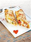 Vegetable,egg and cheese rolled pancakes
