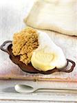 Sponge-shaped almond cake and white chocolate shaped soap