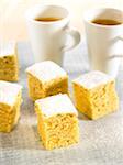 Cake cubes and tea