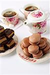 Tea time with macaroons and biscuits