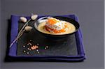 Cream of orange lentil soup with surimi