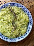 Grated cucumber with rosemary