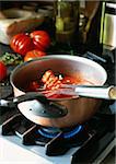 Saucepan with tomato coulis