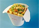 Take-away punnet of fusilli with vegetables