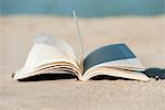 Open book on beach