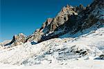 Snowy mountain peaks against clear sky