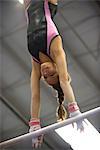 Female gymnast on horizontal bar