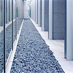 Gravel in front of a modern building