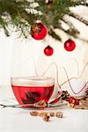 Glass of tea and Christmas decoration