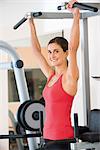 Woman exercising at a health club