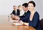 Four businesspeople in conference room