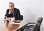 Businessman sitting in conference room