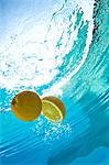 Lemon floating in swimming pool