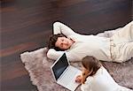 Couple relaxing together on rug