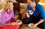 Couple having cup of coffee together