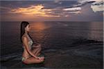 Woman Meditating on Beach, Hua Hin, Thailand