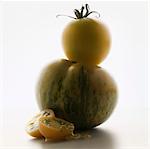 Stacked green tomatoes