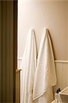 White towels hanging in a bathroom