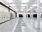 Bank of white server cabinets, UK.