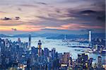 Hong Kong Island and Kowloon skylines at sunset, Hong Kong, China, Asia