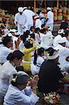 People praying at temple ceremony, Bali, Indonesia, Southeast Asia, Asia