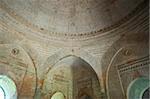 Domed interior and arches of the 15th century Lattan mosque, showing alternating horizontal bands of bricks, Gaur, West Bengal, India, Asia