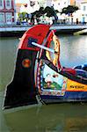 Prow of a colourful, handpainted Moliceiro boat used for sightseeing trips along the canals of Aveiro, Beira Litoral, Portugal, Europe