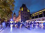 Christmas ice skating rink outside the Natural History Museum, Kensington, London, England, United Kingdom, Europe