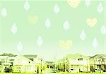 Leaves floating and hearts above residential area