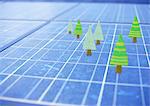 Miniature trees on solar panels