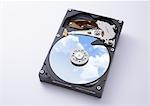 Hard disk reflecting blue sky