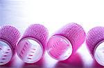 Pink hair curlers, close-up