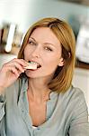 Portrait of a woman eating rice cake