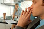 Businessman with hands joined, close-up