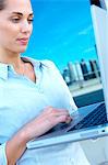 Businesswoman using laptop