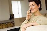 Mid adult woman talking on a mobile phone