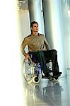 Mid adult man sitting in a wheelchair