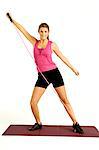 Portrait of a young woman exercising with a resistance band