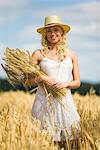 Young woman in wheat field